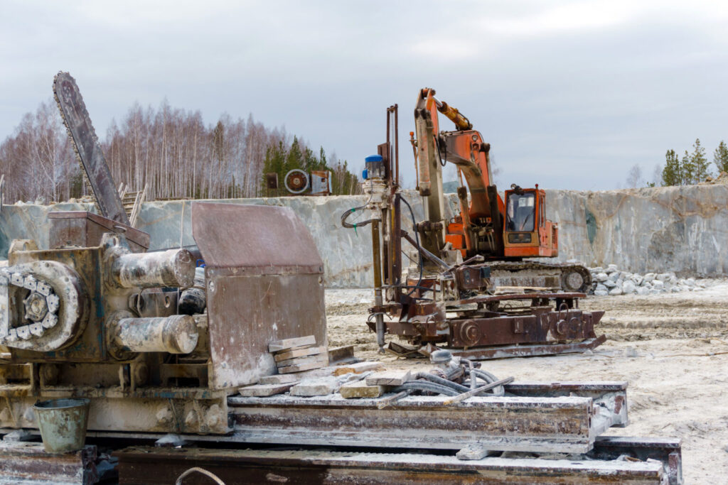 old dirty bandsaw other machines processing stone blocks stands quarry extraction marble 1536x1024 1 industrial demolition